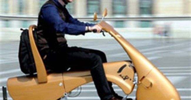 Xe máy có thể gập thành vali kéo