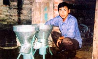 Chàng “cựu binh chân đất” và chiếc máy băm bèo