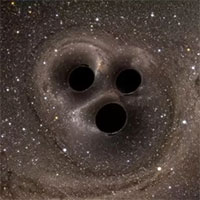 Ba hố đen xoay tròn quanh nhau trước cuộc đụng độ