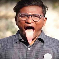 Người đàn ông có lưỡi dài nhất thế giới, uốn qua vòm miệng vào khoang mũi