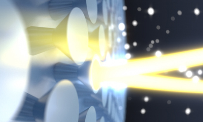 Minh họa chùm laser CW công suất cao chiếu vào các cấu trúc nano trên gương kim cương.