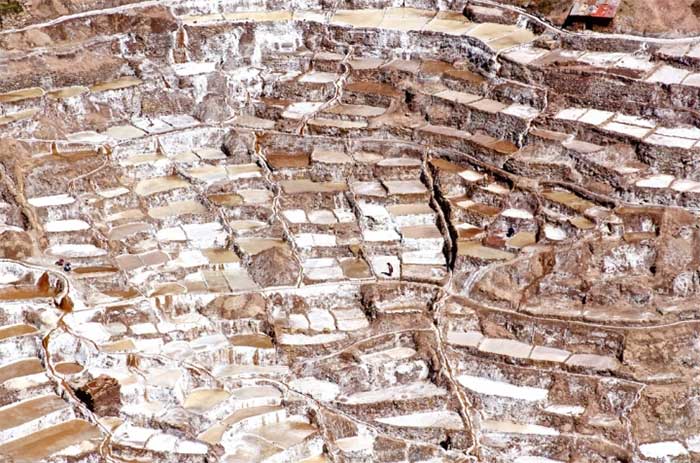 The impressive view of the salt ponds resembling terraces when viewed from above.
