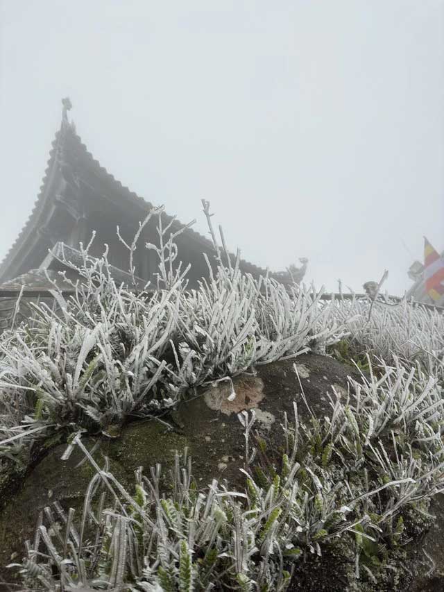 Snow and ice cover Dong Pagoda on Yen Tu peak