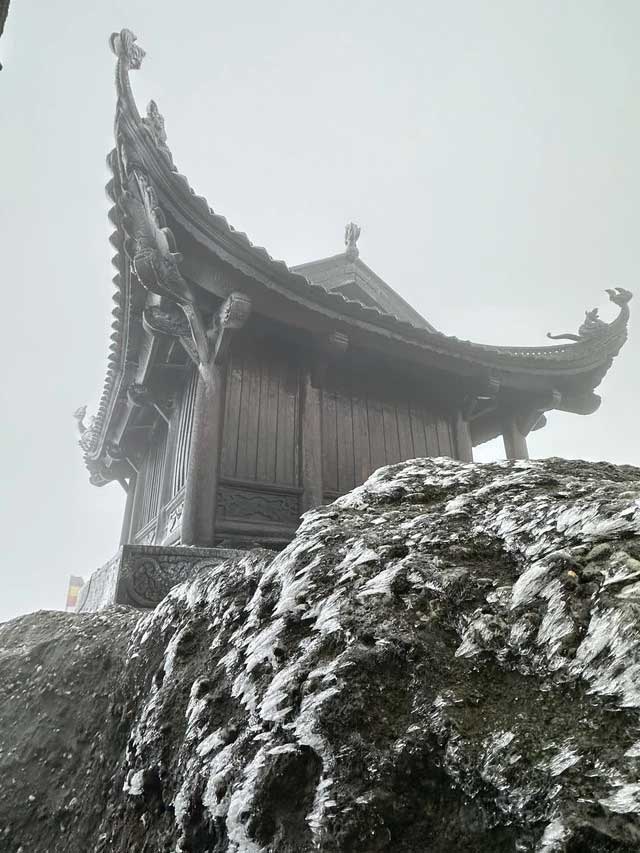 Snow and ice cover Dong Pagoda on Yen Tu peak