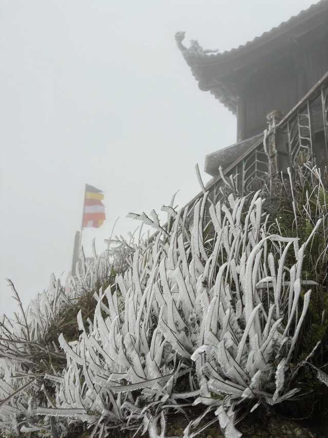 Snow and ice cover Dong Pagoda on Yen Tu peak